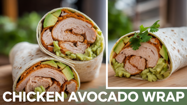 A delicious chicken avocado wrap filled with juicy grilled chicken, creamy avocado slices, fresh spinach, and cherry tomatoes, wrapped in a soft tortilla – a perfect healthy and protein-packed lunch from our Chicken Avocado Wrap Recipe.